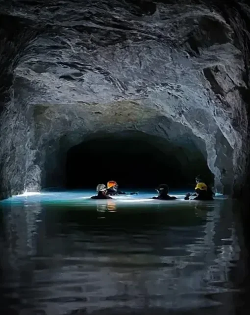 four mine divers preparing t explore an unknown mine in Thailand